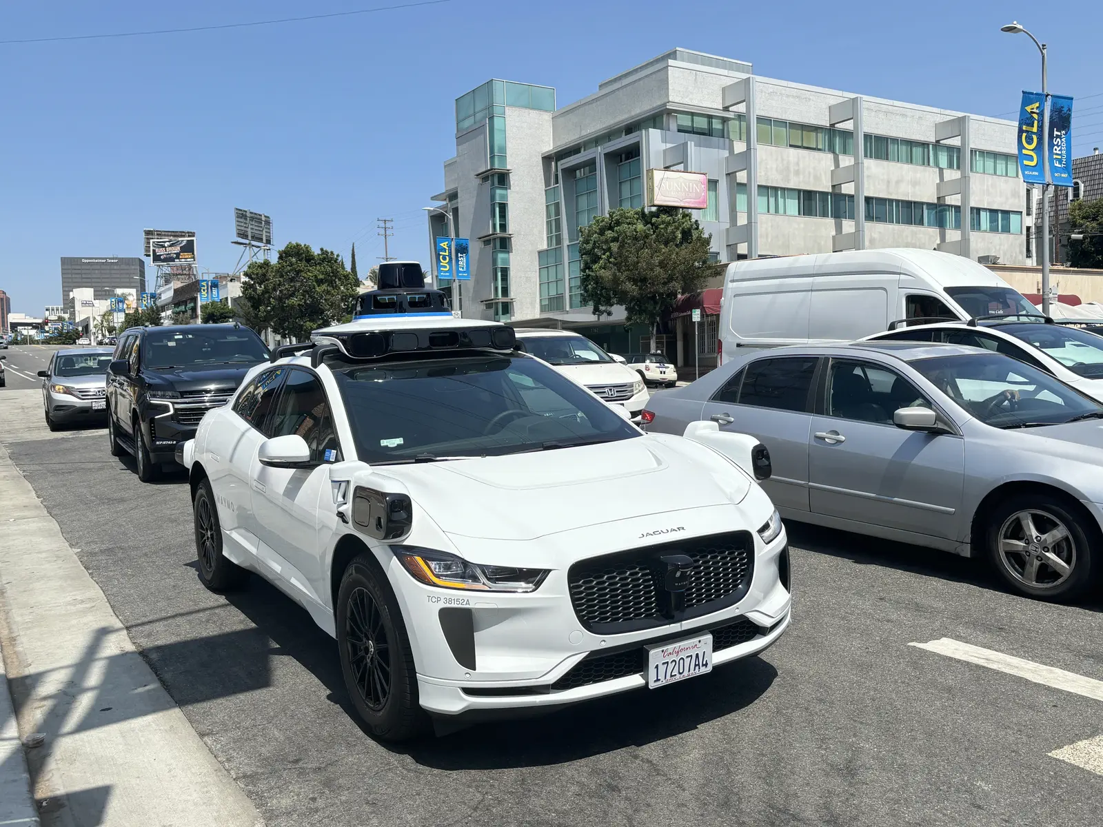 A Waymo Jaguar I-Pace on Westwood Boulevard, Los Angeles, in August 2024; not a Toronto deployment
