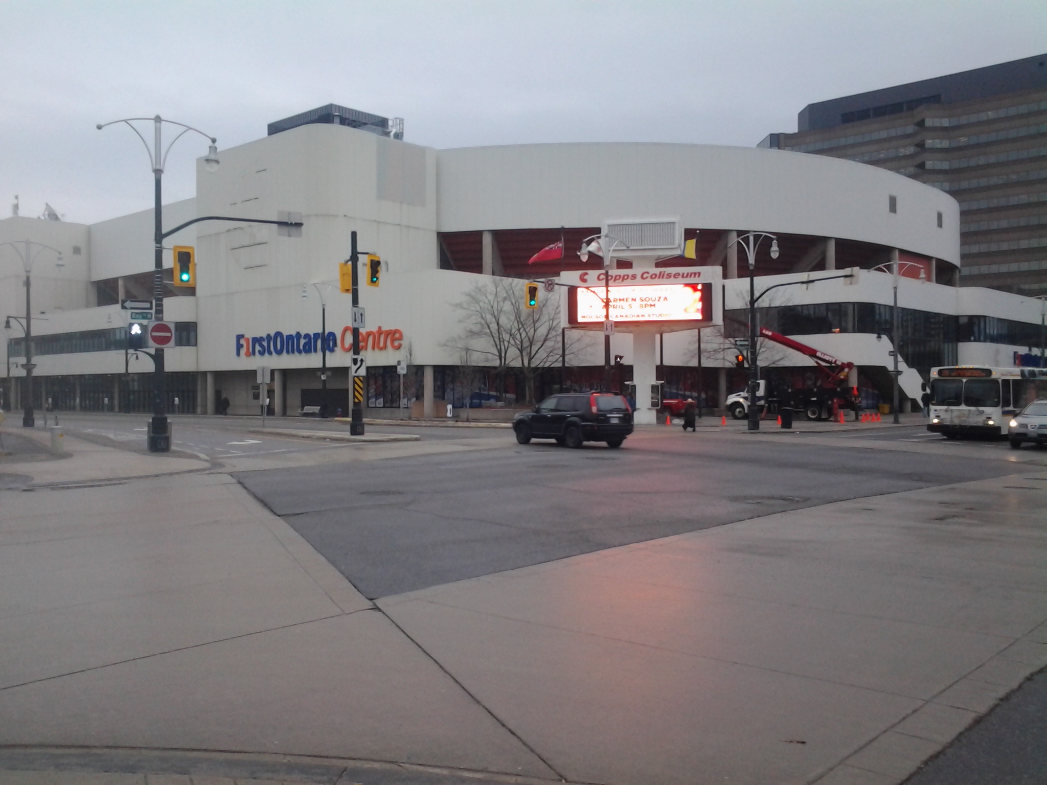 Hamilton arena exterior with FirstOntario Centre and Copps Coliseum signage, March 2014 file photograph by Vhayes1992; not the current renovated venue or October 16 game